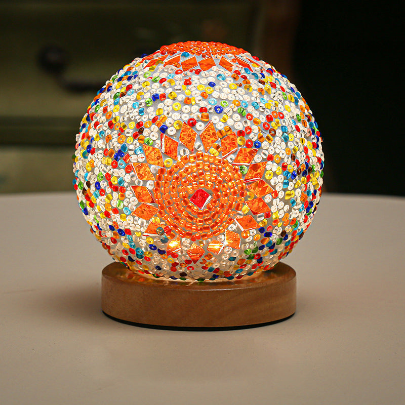 GloedNest – Sferische Glastischlampe