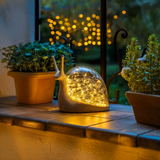 Dekorative Gartenlampe in Schneckenform