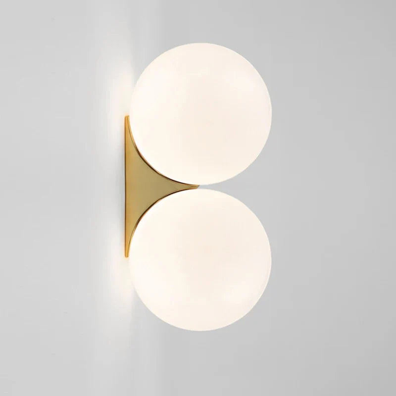 DualGlow – Goldene Wandleuchte