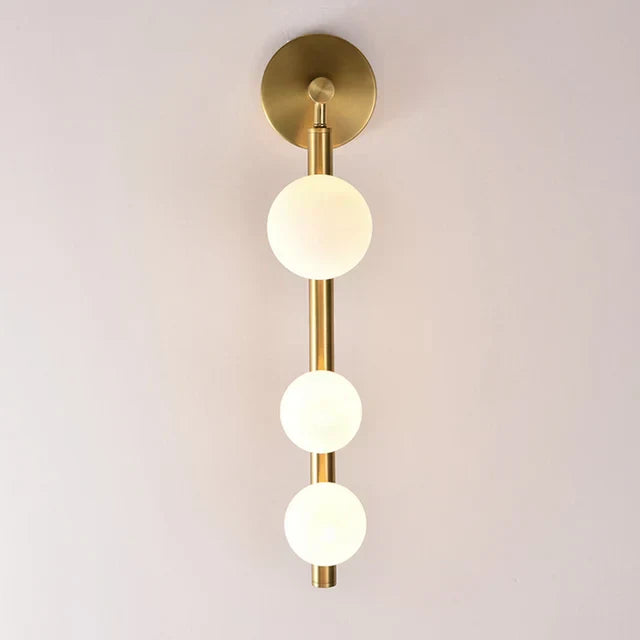 GoldenSphere – Goldene Wandleuchte