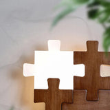 PuzzleGlow – Holz Wandleuchte